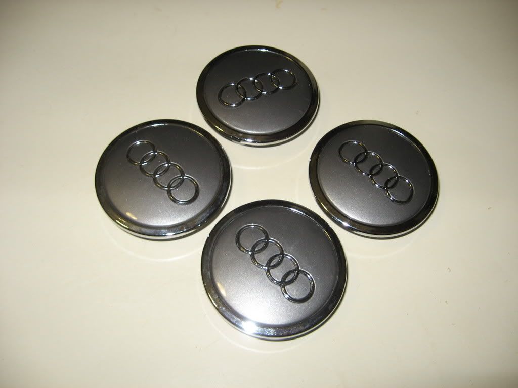 Audi center caps for wheels how much are these worth? VW Vortex