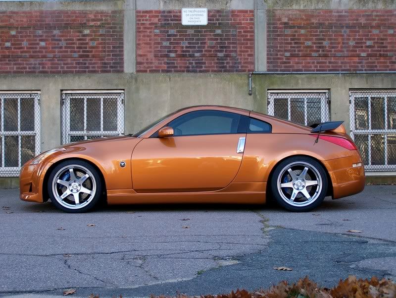 Gold Nissan 350Z with 19 Volk TE37 Killing combination with black rear 