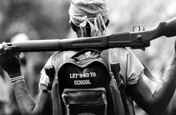 http://i110.photobucket.com/albums/n111/littletinyfish/bring-guns-to-school.jpg