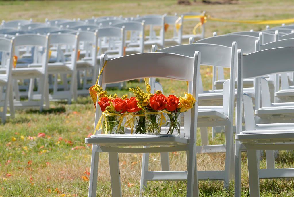 White folding chairs all lined up for a ceremony may be one of the simplest
